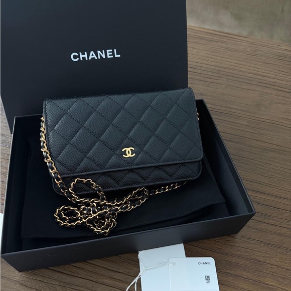 CHANEL Handbags - Chanel Black Quilted Leather Wallet on Chain